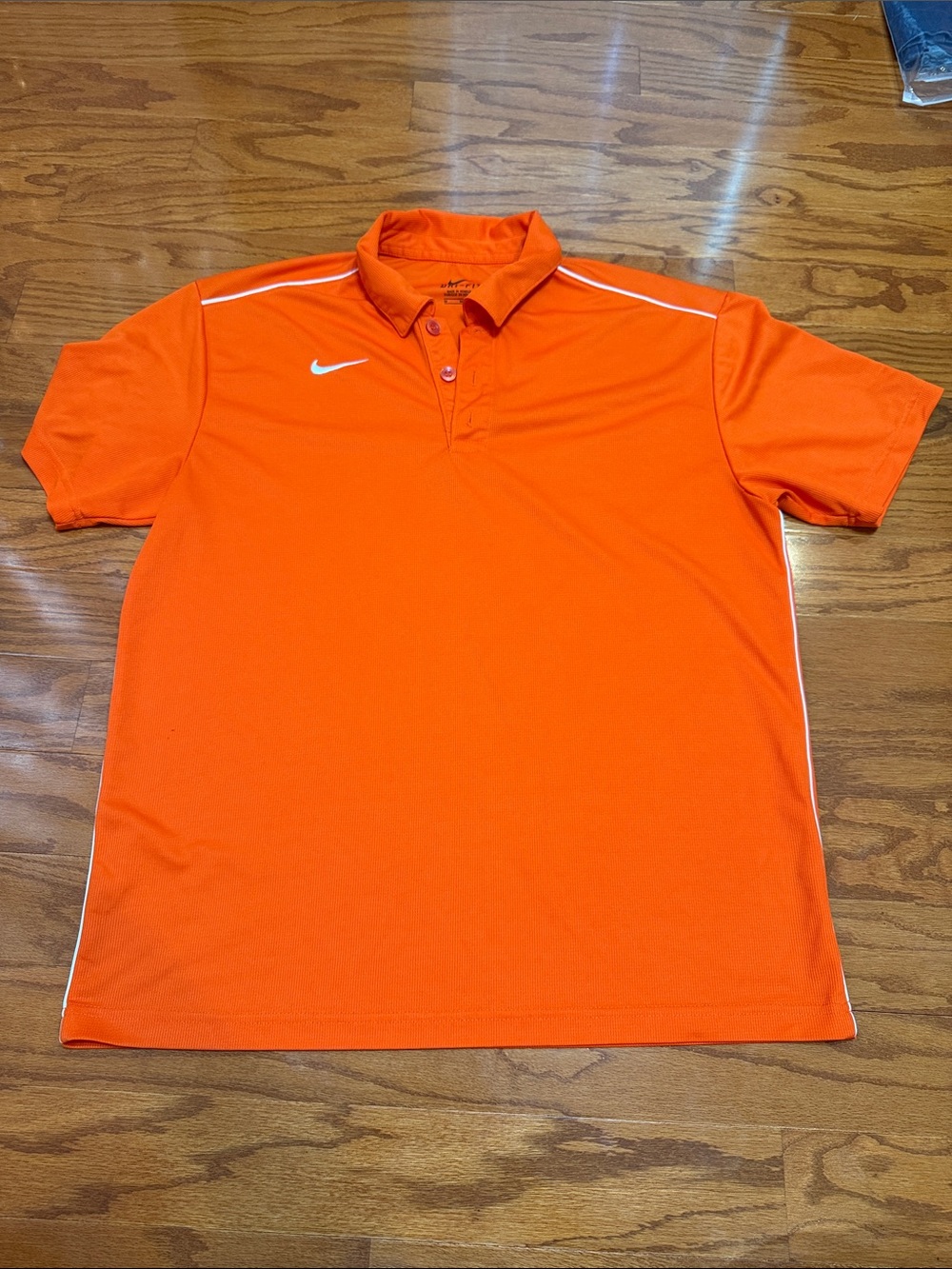 Nike Men’s Bright Orange Polo with White Swoosh. Dri-fit shirt.  Smoke free home